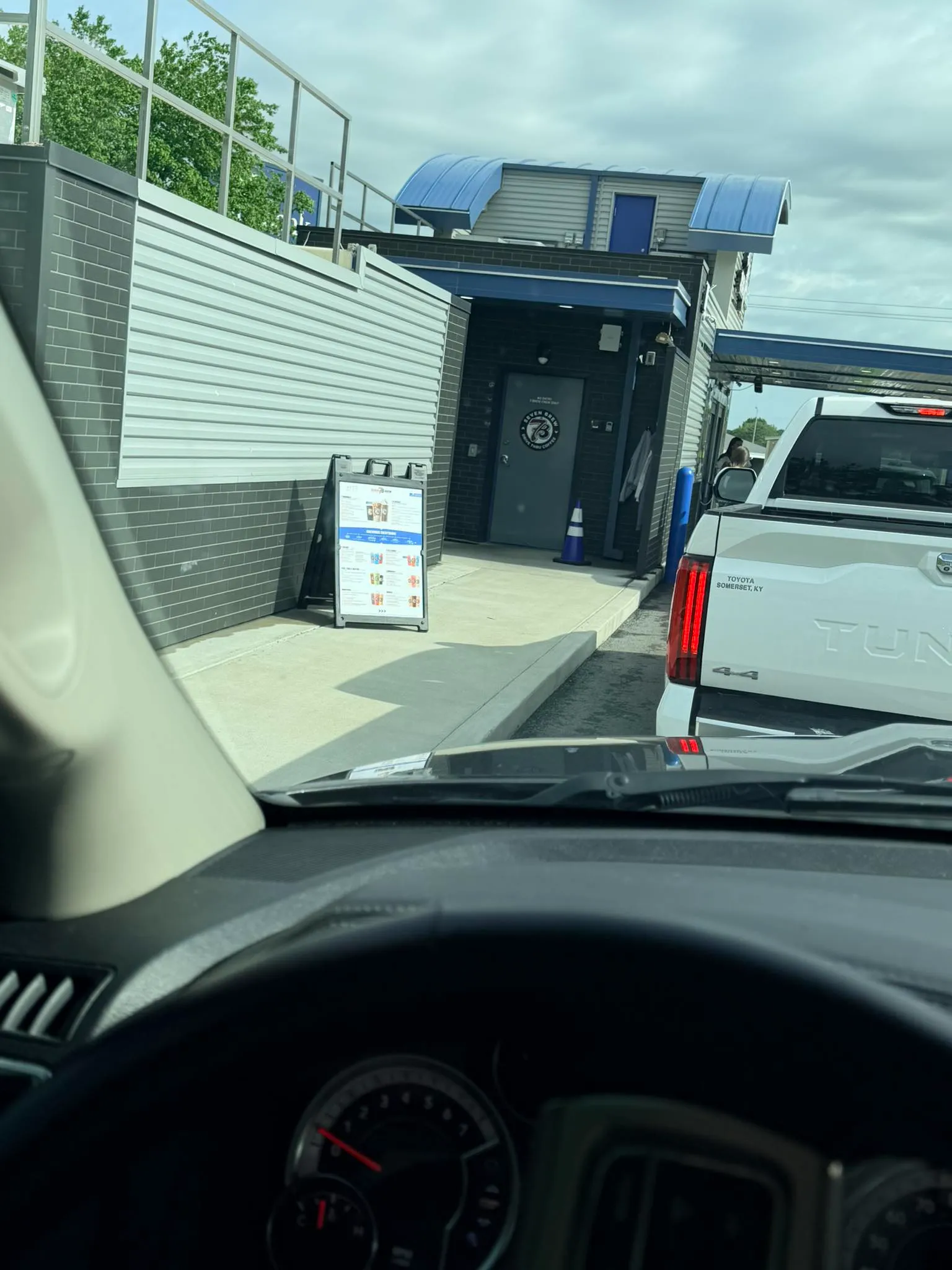 7 Brew drive-thru lane showing fast service window interaction